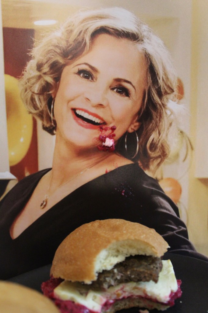 Amy Sedaris smashing a delightful Lamby Slidaris