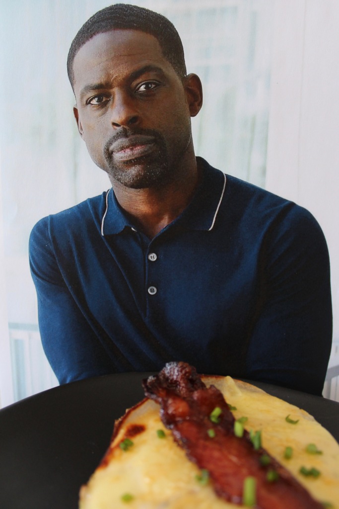 Sterling K. Brown pensively eating a Sterling K. Hot Brown, pondering our beautiful friendship.